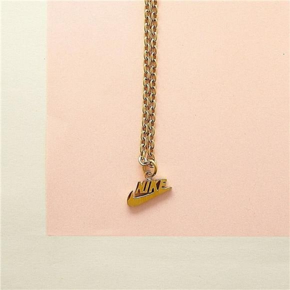 NEW NIKE GOLD NECKLACE STAINLESS STEEL 20" INCH‎ CHAIN WITH ADJUSTER SWOOSH - Picture 2 of 4